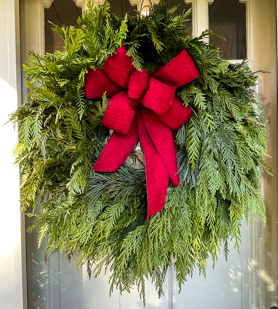 evergreen wreath on a front door