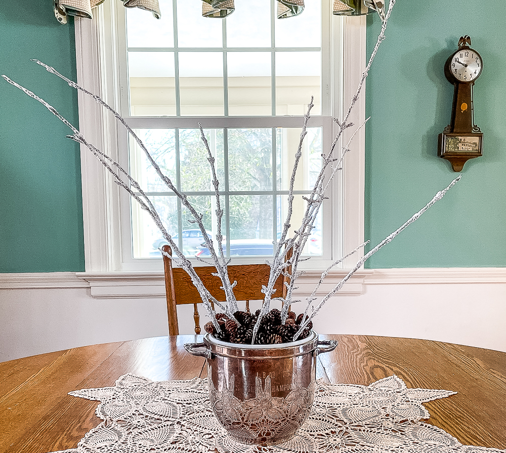 DIY frosted branches in a vintage silver ice bucket trophy