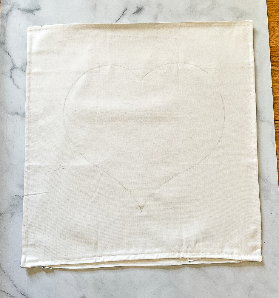 Heart penciled on a pillow cover