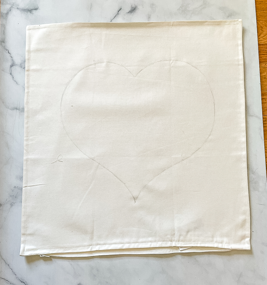 Heart penciled on a pillow cover