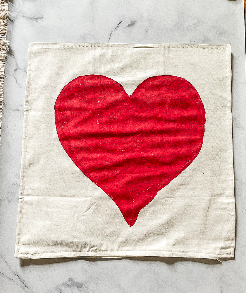 Heart painted on a pillow cover